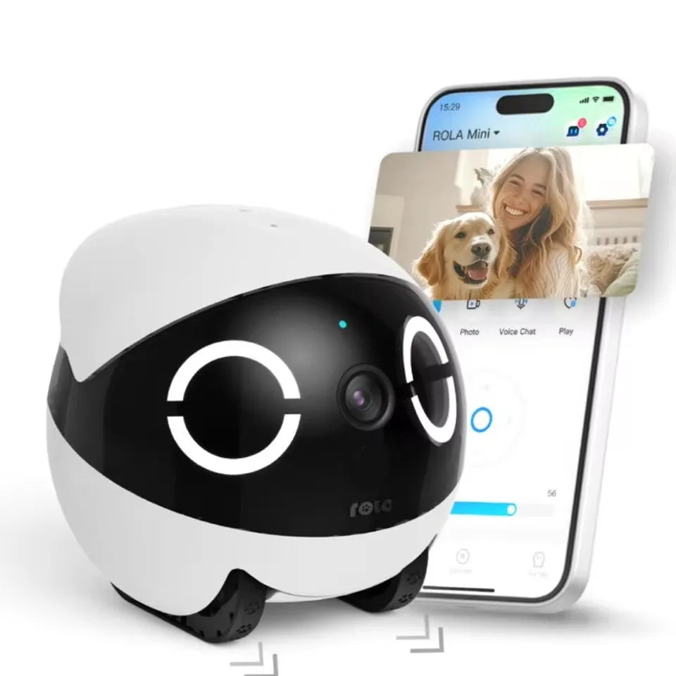 New Enabot Mini Pet Companion Robot next to a smartphone displaying a video chat with a smiling woman and dog.