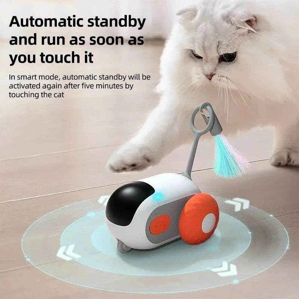 Automatic Rolling Smart Cat Toy Car in action with a playful cat ready to chase it.