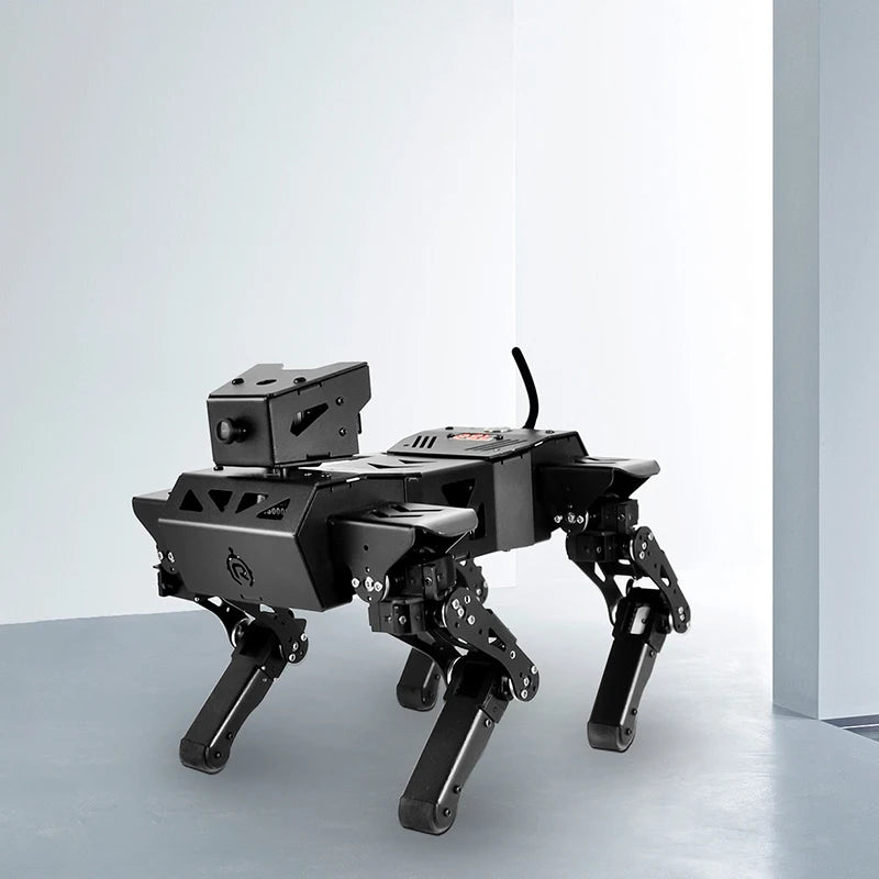 Quadruped robot dog standing on a grey floor, showcasing its advanced robotic legs and sleek design.