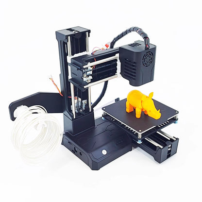 entry-level Mini 3D printer producing a vibrant yellow elephant model on a smooth surface.